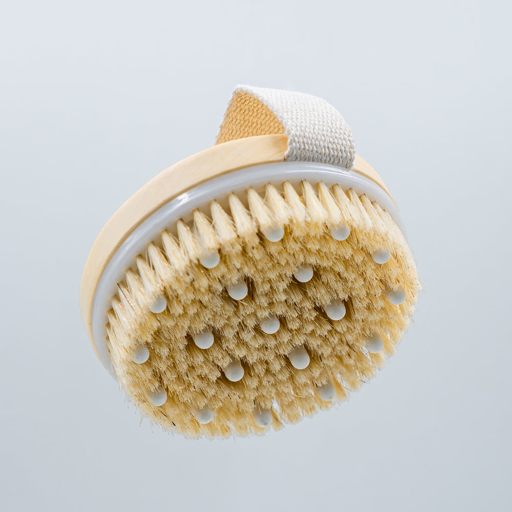 MASSAGING EXFOLIATING BRUSH